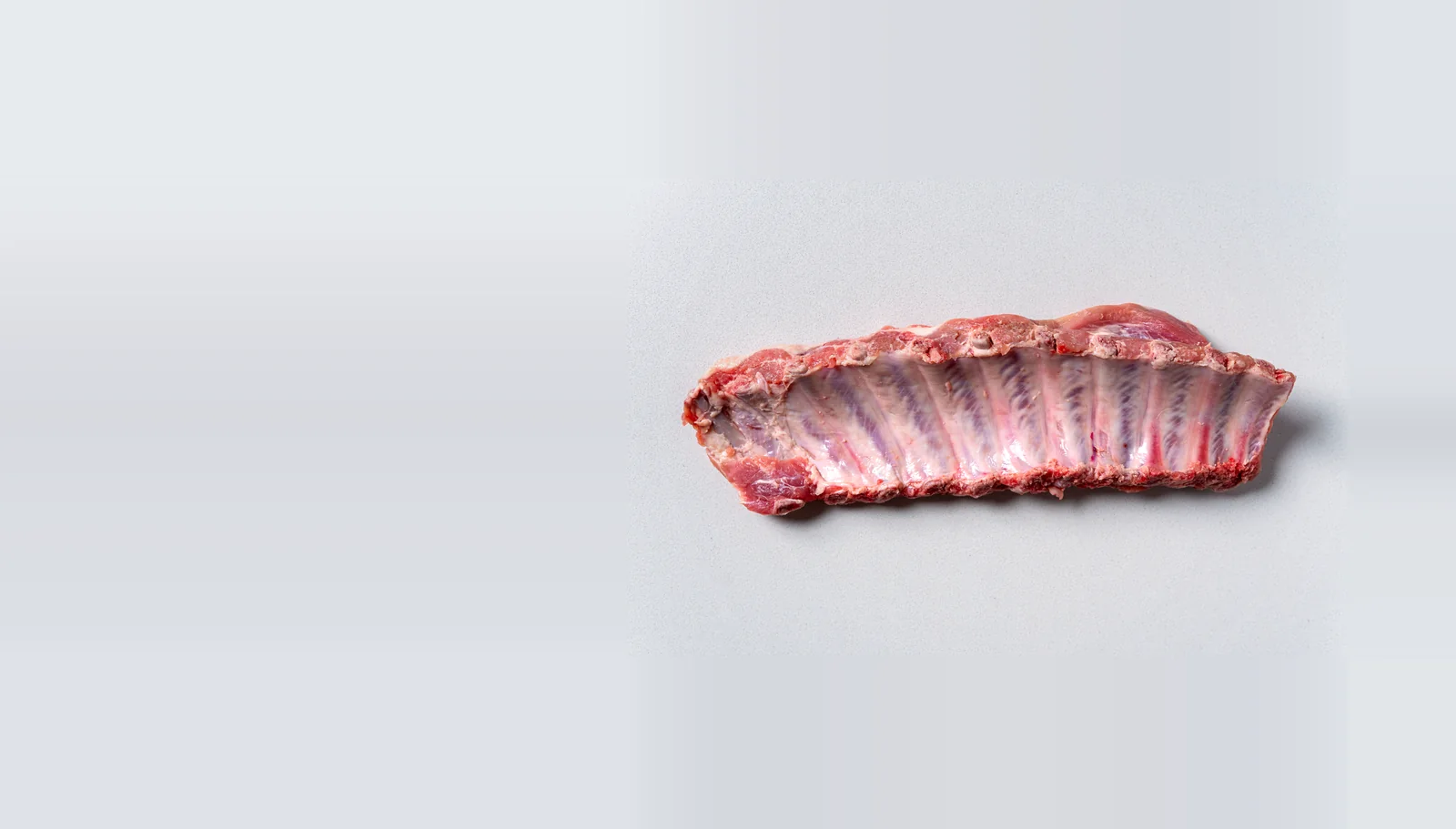A rack of pork spare ribs